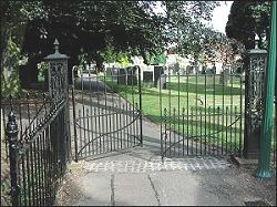  restored ironwork gates at the entrance to Saint Bartholomew's Churchyard 