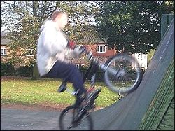  half pipe ramp with bike rider 